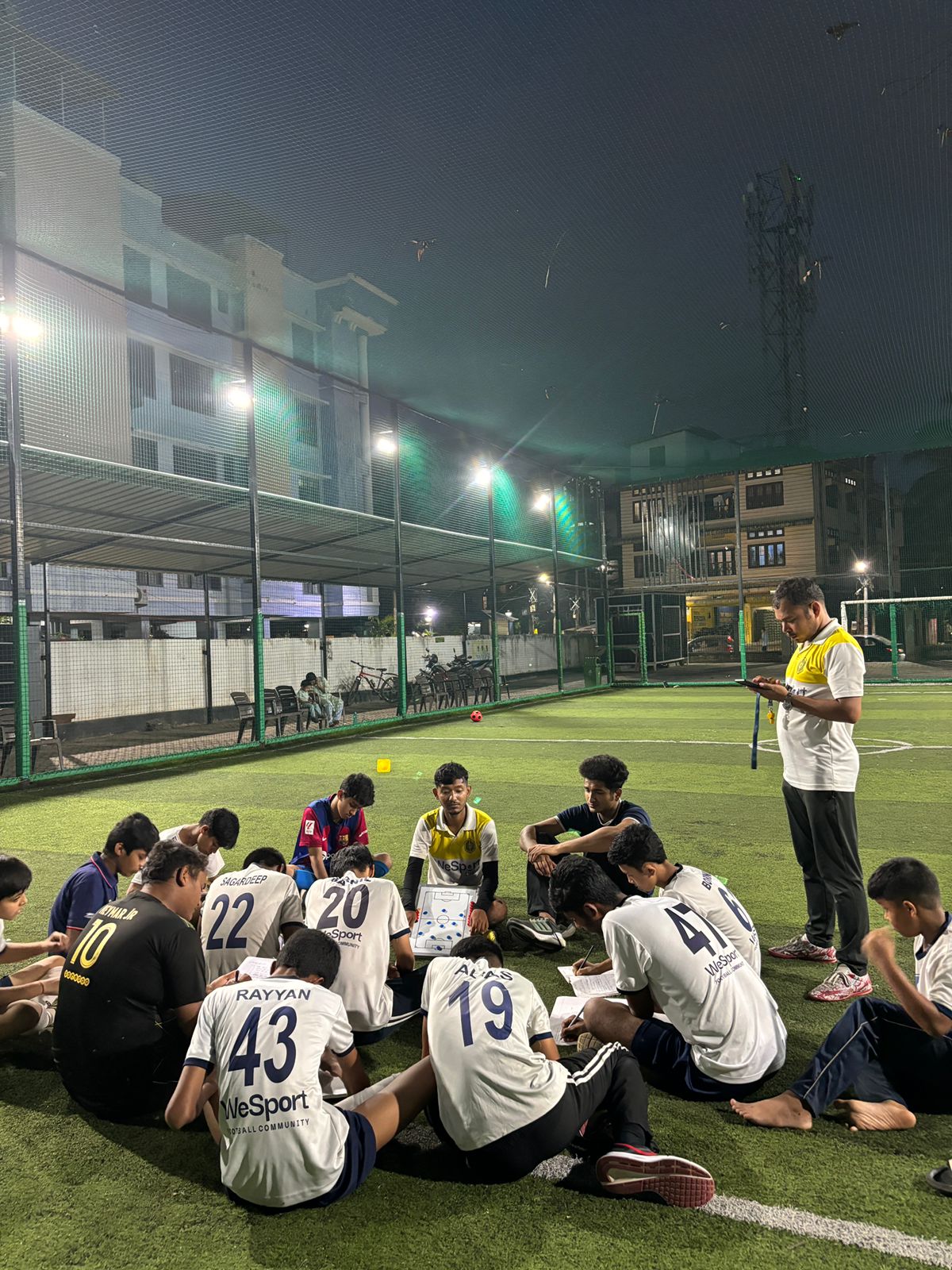 Football team meeting and tactical discussion at WeSport Guwahati Academy